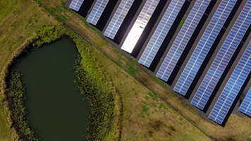 Aerial view of solar panels in the countryside